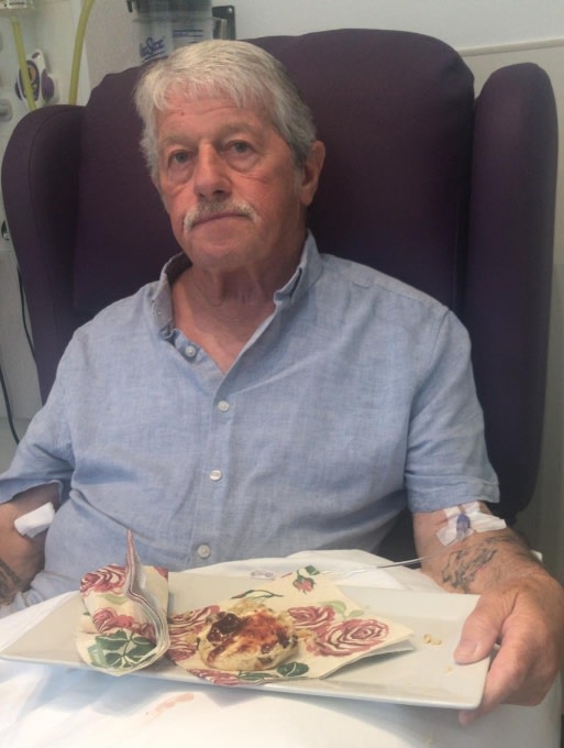 Terry taking cream tea at the Clatterbridge Clinic